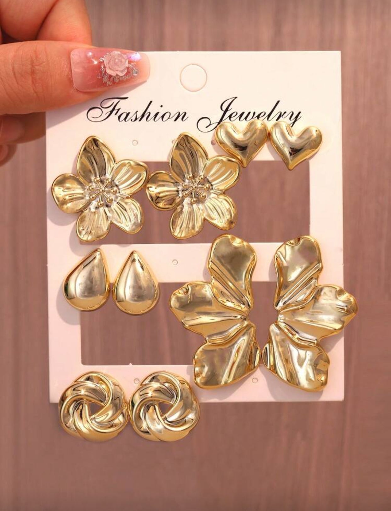Elegant Gold Earrings in Various Floral Shapes